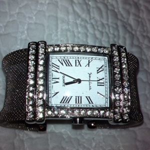 SUSAN LUCCI WATCH~ QUARTS SILVER TONE WATCH~EUC